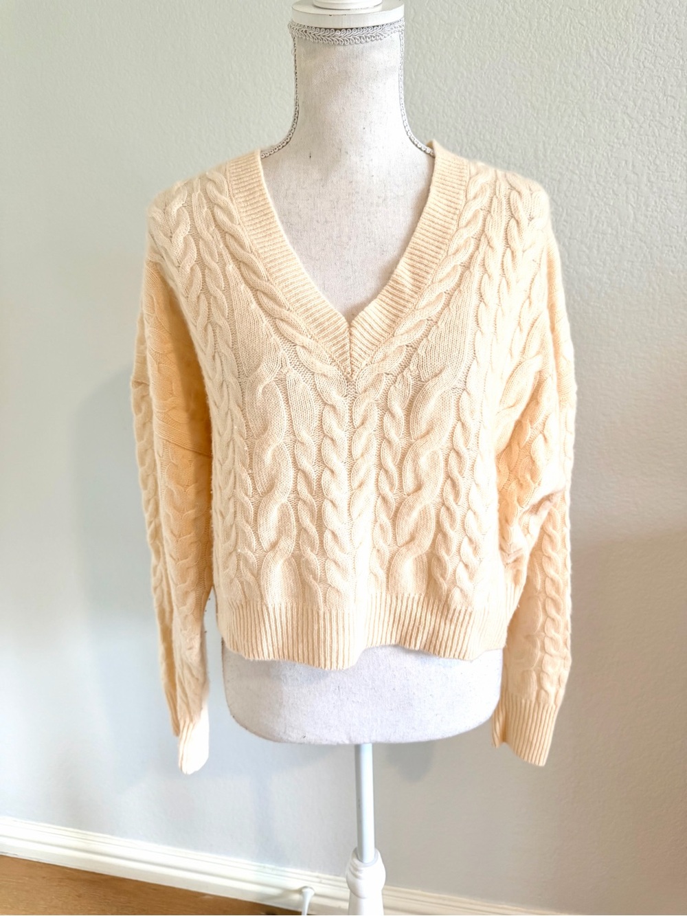 V-Neck Cable Knit Cashmere Sweater in Cream
